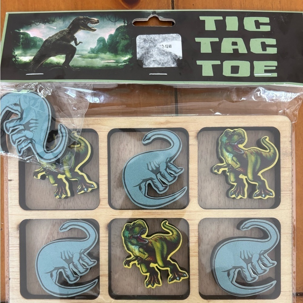 Dinosaur tick tack toe game. Brand new